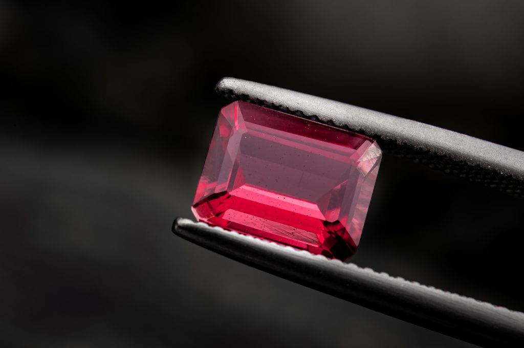 Red ruby gemstone  with dark blackground.